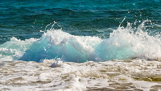 wave of body of water near seashore during daytime thumbnail