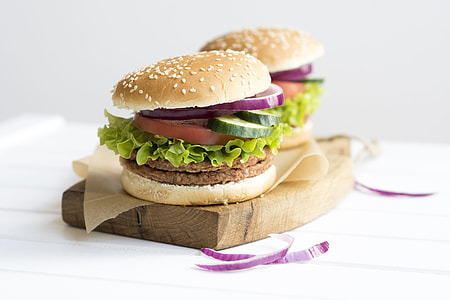 selective focus photography of burgers with patties thumbnail
