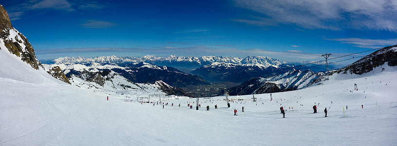 snow covered mountain during daytime thumbnail
