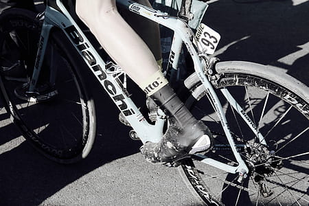 person riding white Bianchi city bicycle thumbnail