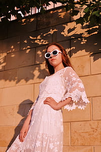 woman wearing white dress thumbnail