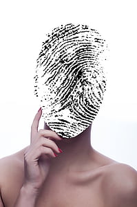black and white finger print on person's face thumbnail