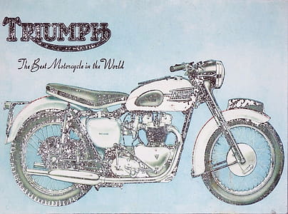 Vintage worn advertising sign board for the Triumph brand, a famous motorcycle manufacturer - Editorial use only thumbnail