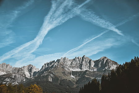 gray rock formation under blue sky thumbnail