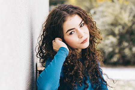 woman wearing teal long-sleeved shirtr thumbnail
