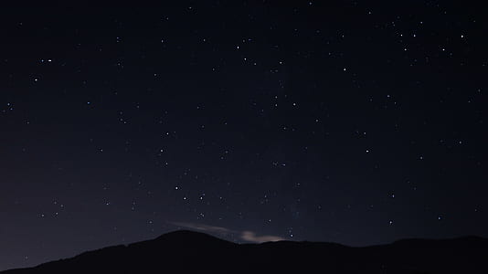 mountain and star photo during nightime thumbnail