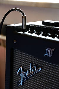 black Fender guitar amplifier with cable thumbnail