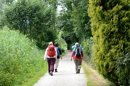 three person wearing hiking backpacks thumbnail