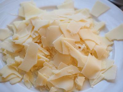 sliced cheese on plate thumbnail