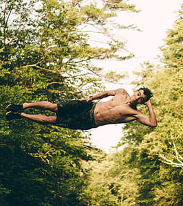 man hands on head jumping on water thumbnail