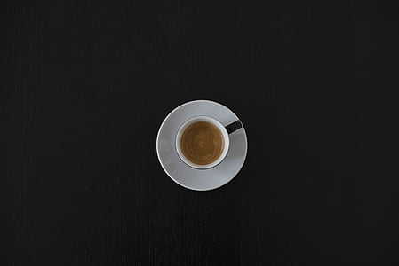 filled of brown liquid in white ceramic mug thumbnail