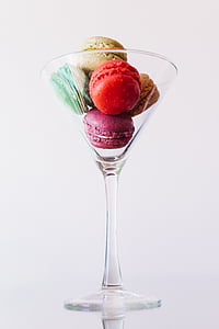 four maracons inside clear long-stem wine glass thumbnail