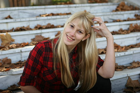 woman sitting on bleachers thumbnail