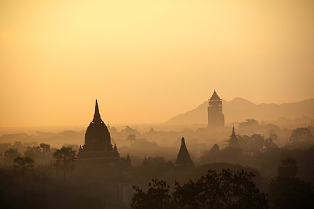 silhouette photography of structures during daytime thumbnail