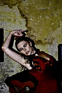 woman doing pose against wall thumbnail