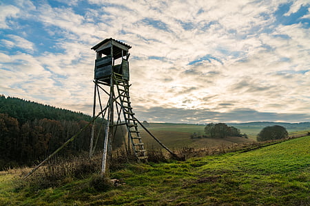 brown wooden watch tower thumbnail