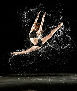 woman dancing with splash of water thumbnail