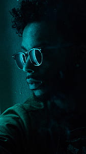 portrait photography of man wearing sunglasses thumbnail