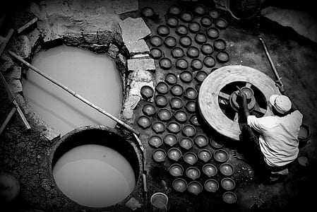 grayscale photo of man working thumbnail