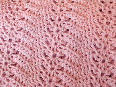 pink knitted textile thumbnail