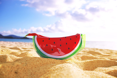 watermelon wristlet on brown sand thumbnail