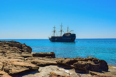 sailing ship on body of water thumbnail