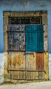 blue, gray, and yellow closed door thumbnail