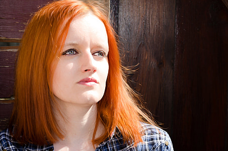 woman wearing blue, white, and black plaid shirt thumbnail