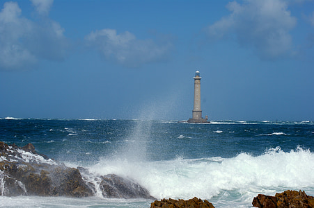 raging body of water near rock thumbnail