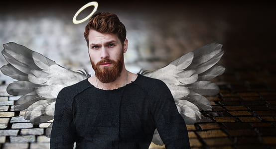 man wearing black crew-neck long-sleeved shirt thumbnail