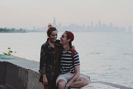 woman standing beside man thumbnail