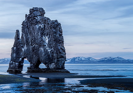 gray rock on seashore landmark thumbnail
