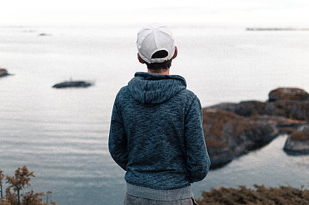 person standing front of river thumbnail