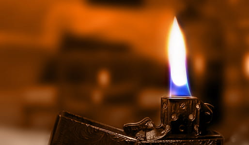 selective focus photography of flip lighter fie thumbnail