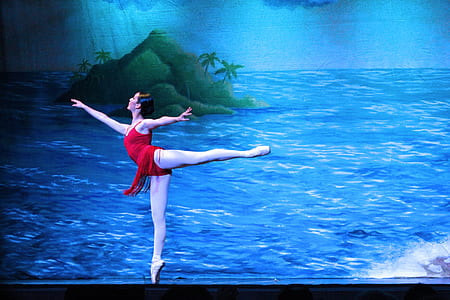 woman wearing red dress dancing thumbnail
