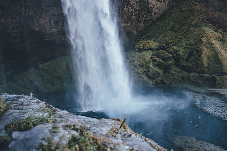 waterfalls between rocks thumbnail