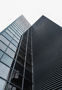 worm's-eye view photography of black high-rise building thumbnail