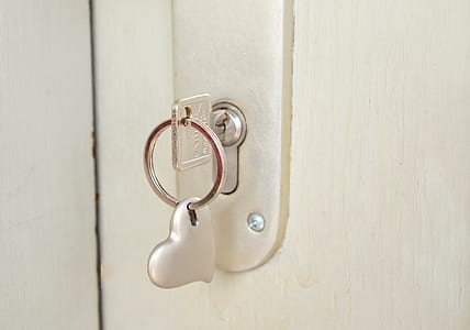 gray metal door lock with stainless steel key thumbnail