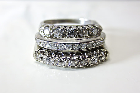 silver-colored ring with diamond stones thumbnail