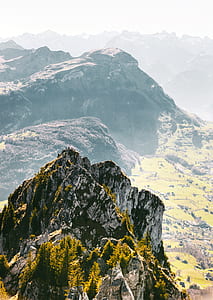 high angle photo of rocky mountain range thumbnail