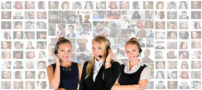 three women wearing headset with woman portrait lot in background thumbnail