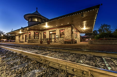commercial building beside train rail thumbnail