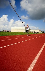 man holding jumping pole thumbnail
