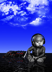 baby wearing black headphone edited photo thumbnail