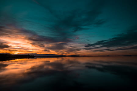 photography of horizon during sunset thumbnail