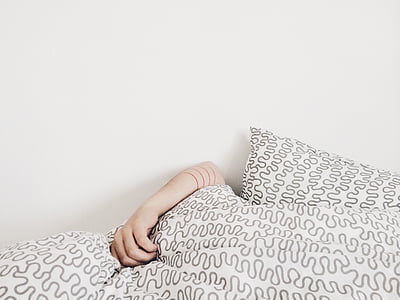 person hides under blanket thumbnail