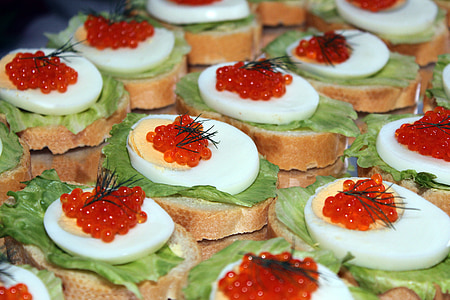 sliced sliced bread with hard boiled egg and caviar eggs toppings thumbnail