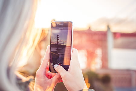 Young Woman Taking a Video of The Golden Gate Bridge thumbnail