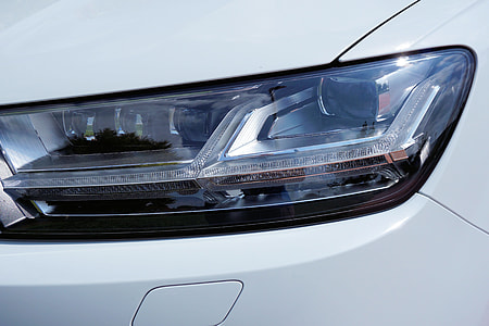 close-up photography of vehicle headlight thumbnail