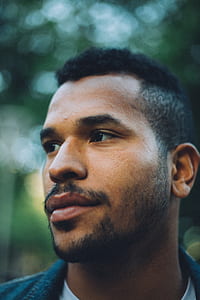 man wearing blue top thumbnail